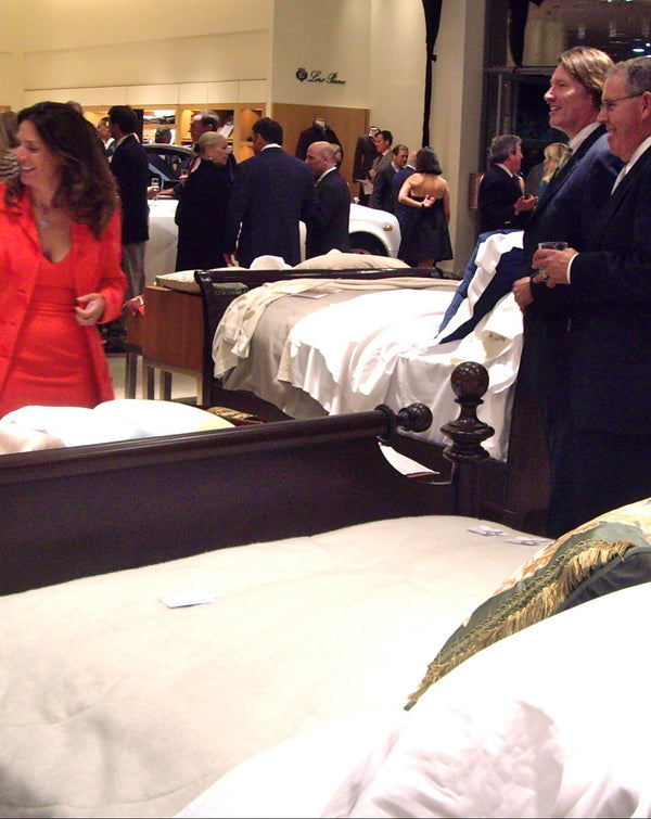 Heather explaining linens to guests at the Richards Robb Report Best of the Best Event in Connecticut.
