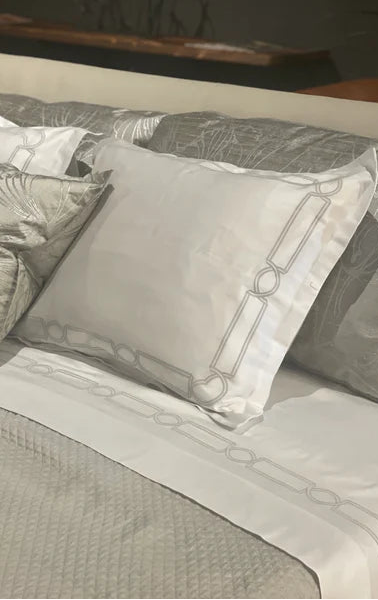 Barbara Beckmann silk tulips on Kearsley cashmere king shams,  Kearsley Montecito extra long staple luxuious Italian linens with Kearsley moulding embrodiery in taupe and Cantoni Dallas.