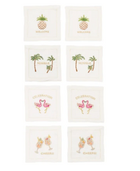 Set of eight white Kim Seybert Mingle cocktail napkins with colorful hand-embroidered celebratory phrases.